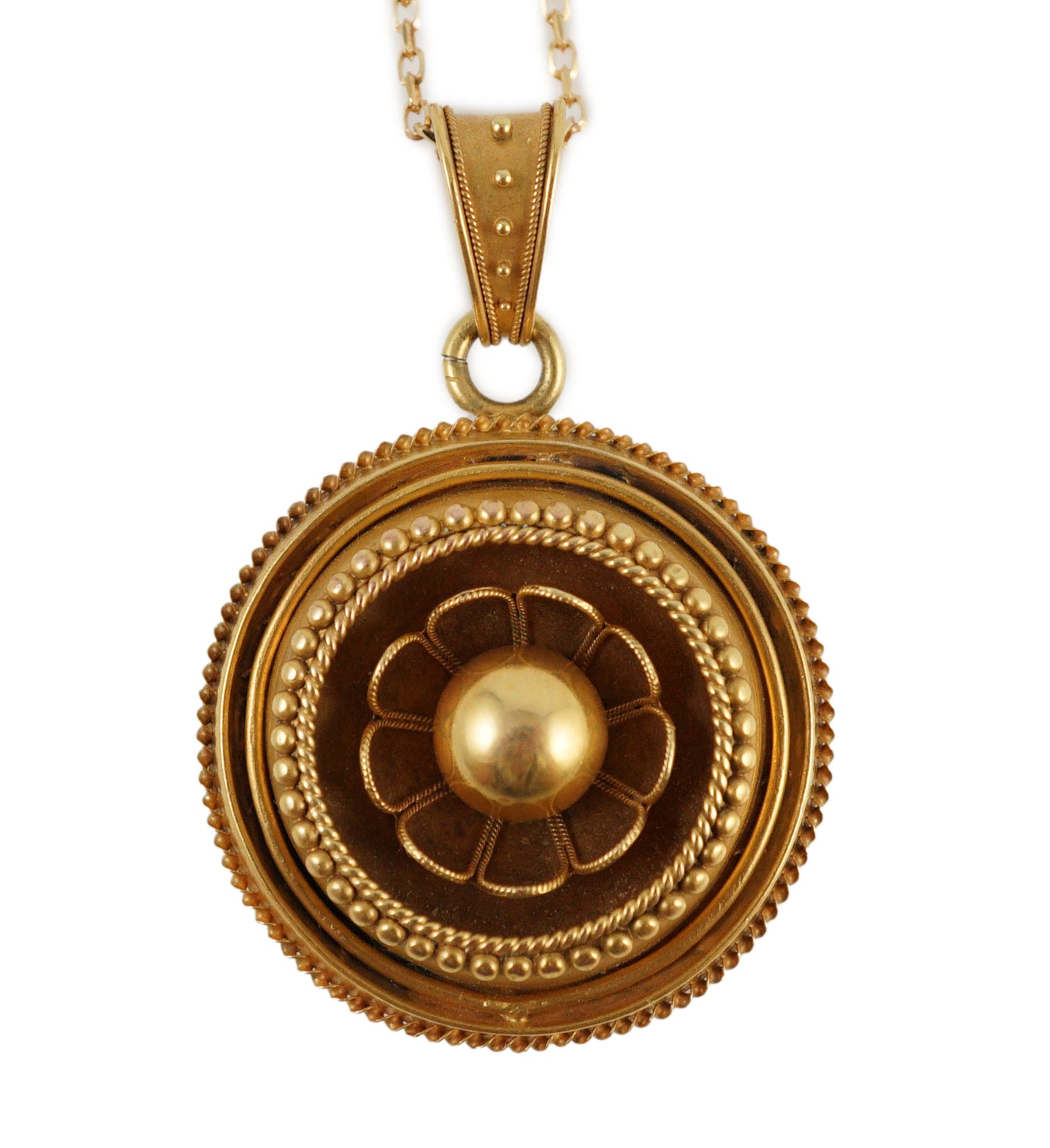 A Victorian gold circular pendant, with flower head centre and glazed back, on a later 9ct gold chain